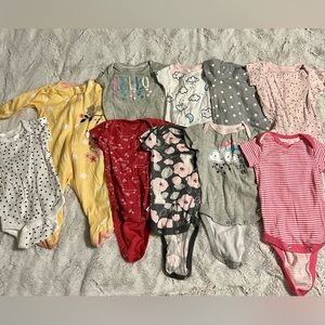 Gerber 0-3 Month; 9 Onsies and 1 Zip Up Pajama.